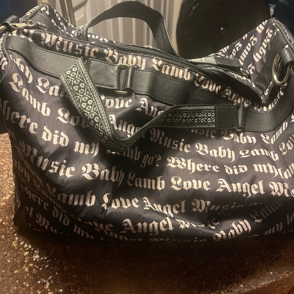 L.A.M.B. Gwen stefani for Lesportsac large love music angel baby tour duffle.